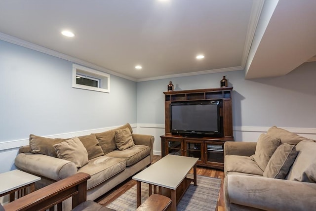 145 Reservoir St, Norton, MA 02766 - living area featuring ornamental molding, a wainscoted wall, recessed lighting, wood finished floors, and a decorative wall