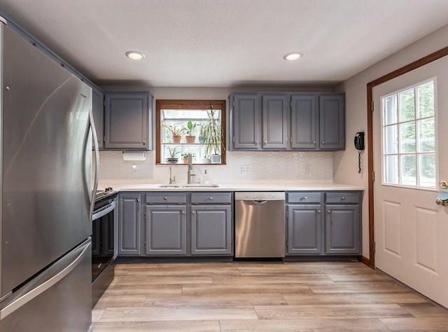 145 Reservoir St, Norton, MA 02766 - kitchen with stainless steel appliances, gray cabinets, a sink, plenty of natural light, and recessed lighting