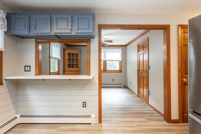 145 Reservoir St, Norton, MA 02766 - hallway featuring a baseboard radiator, light wood finished floors, and baseboards