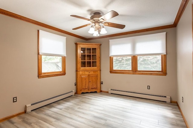 145 Reservoir St, Norton, MA 02766 - empty room with a baseboard heating unit, crown molding, light wood-type flooring, and ceiling fan