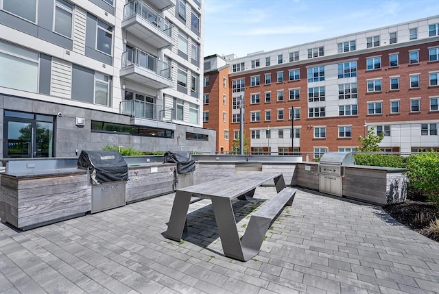 99 Sumner Unit 514, Boston, MA 02128 - view of patio / terrace featuring an outdoor kitchen and area for grilling