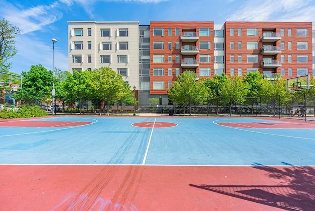 99 Sumner Unit 514, Boston, MA 02128 - view of basketball court featuring community basketball court and fence