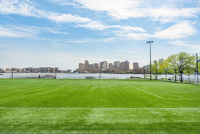 99 Sumner Unit 514, Boston, MA 02128 - view of tennis court with fence and a view of skyline