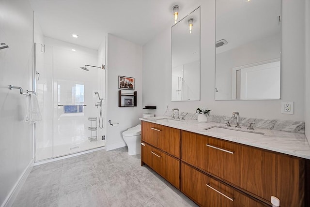 99 Sumner Unit 514, Boston, MA 02128 - full bath with baseboards, toilet, a stall shower, and double vanity