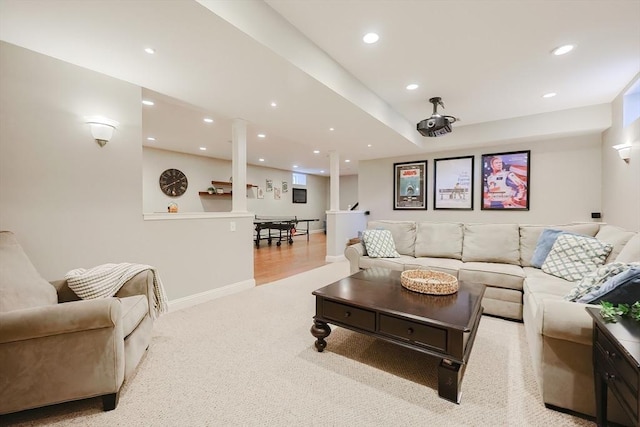 living room with baseboards, carpet floors, and recessed lighting