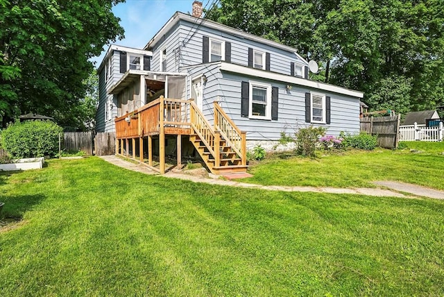 22 Douglas Ave, Maynard, MA 01754 - back of property with stairs, a wooden deck, and a chimney