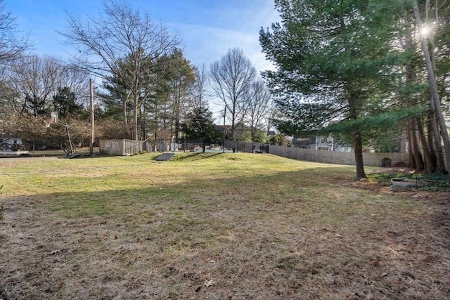 view of yard with fence