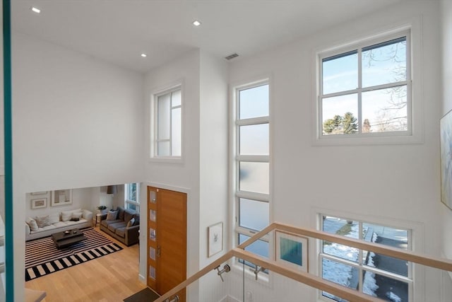 interior space featuring visible vents, wood finished floors, and recessed lighting