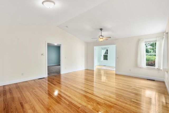 22 Pomeroy Meadow Rd Unit 4, Southampton, MA 01073 - unfurnished living room featuring light wood finished floors, lofted ceiling, and a ceiling fan