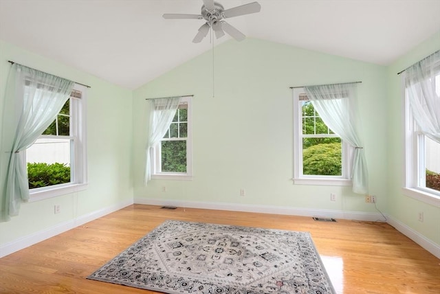 22 Pomeroy Meadow Rd Unit 4, Southampton, MA 01073 - unfurnished room featuring healthy amount of natural light, light wood finished floors, a ceiling fan, and vaulted ceiling