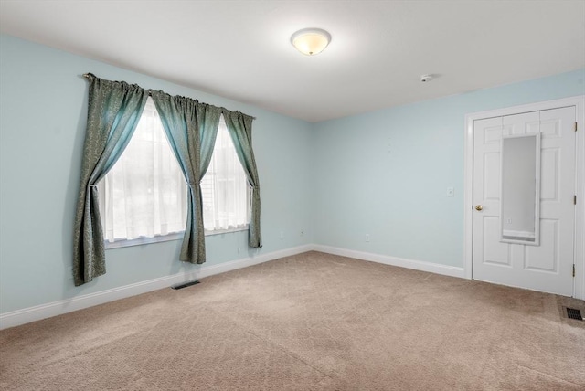 22 Pomeroy Meadow Rd Unit 4, Southampton, MA 01073 - empty room with carpet floors and baseboards
