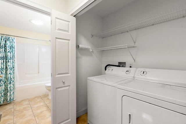 22 Pomeroy Meadow Rd Unit 4, Southampton, MA 01073 - laundry room featuring washing machine and dryer and light tile patterned floors