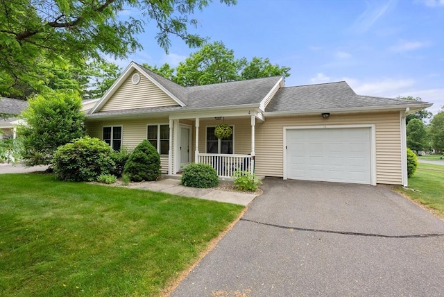 22 Pomeroy Meadow Rd Unit 4, Southampton, MA 01073 - single story home featuring covered porch, a garage, a front lawn, and roof with shingles