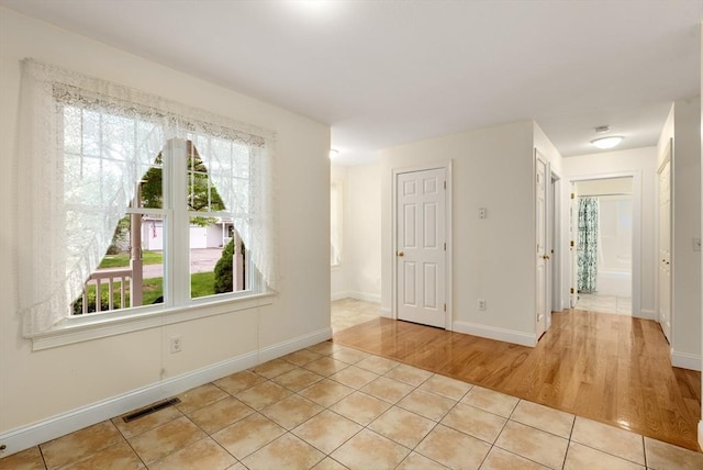 22 Pomeroy Meadow Rd Unit 4, Southampton, MA 01073 - unfurnished room featuring tile patterned floors and baseboards