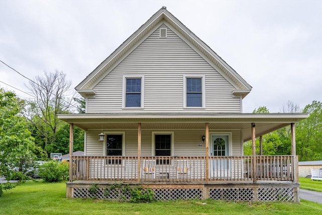86 Lennon St, Gardner, MA 01440 - farmhouse-style home featuring covered porch, a front lawn, and central AC