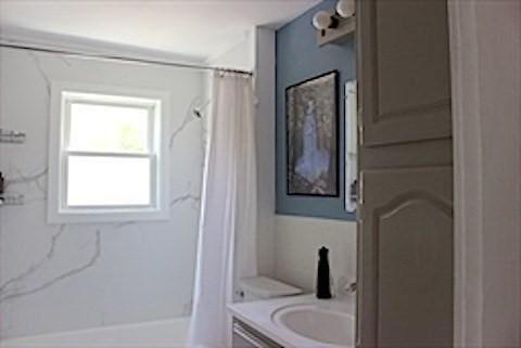 374 Swains Pond Ave, Melrose, MA 02176 - full bath featuring vanity and shower / bath combination with curtain