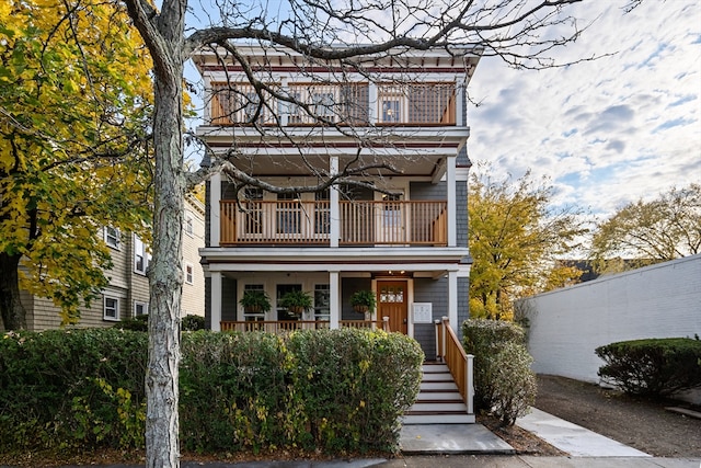 view of front of house with a balcony