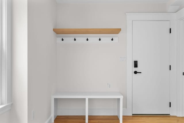 mudroom with light hardwood / wood-style flooring