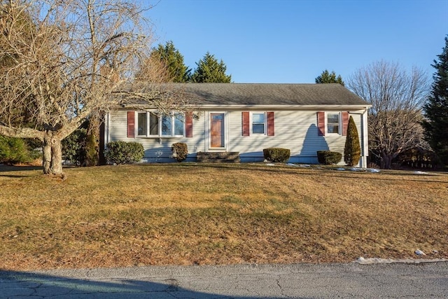 ranch-style home with a front yard