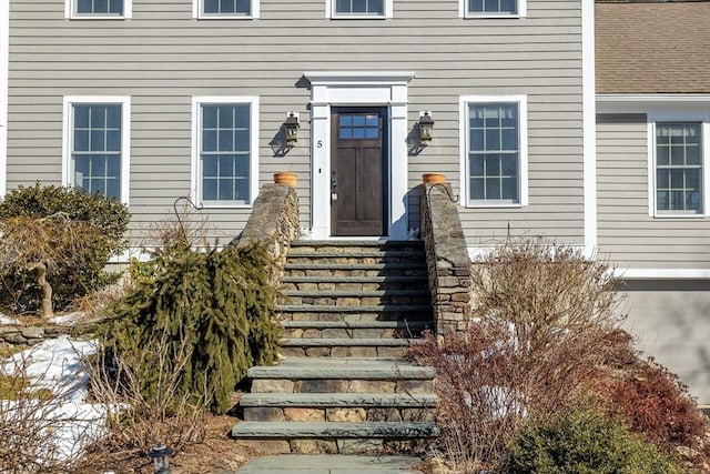 property entrance with a garage