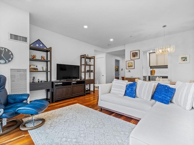 500 Atlantic Ave Unit 16R, Boston, MA 02210 - living area featuring wood finished floors, a chandelier, and recessed lighting