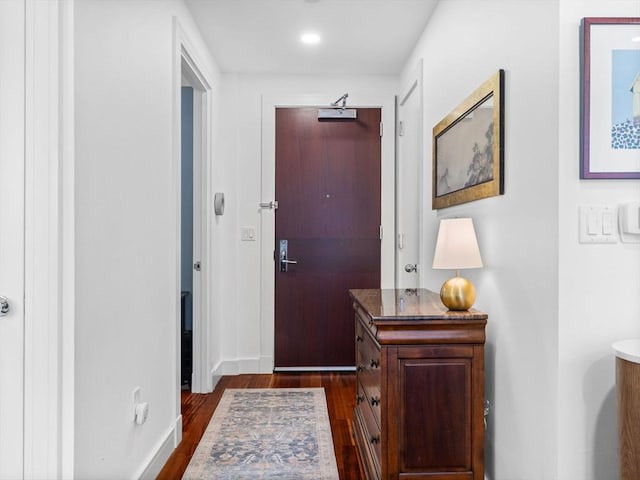 500 Atlantic Ave Unit 16R, Boston, MA 02210 - hallway featuring dark wood-style flooring and baseboards
