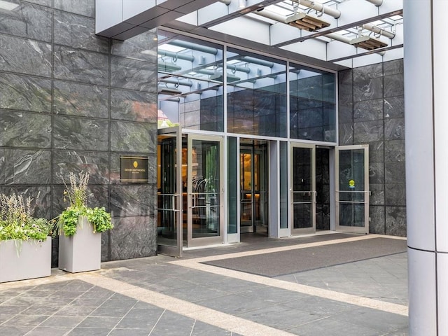 500 Atlantic Ave Unit 16R, Boston, MA 02210 - doorway to property featuring a patio area
