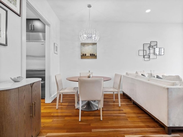 500 Atlantic Ave Unit 16R, Boston, MA 02210 - dining area with wood finished floors, a chandelier, and recessed lighting