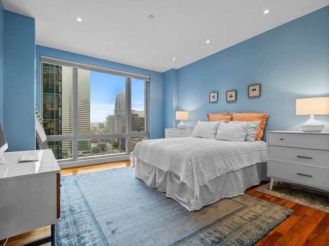 500 Atlantic Ave Unit 16R, Boston, MA 02210 - bedroom featuring wood finished floors, recessed lighting, and a city view