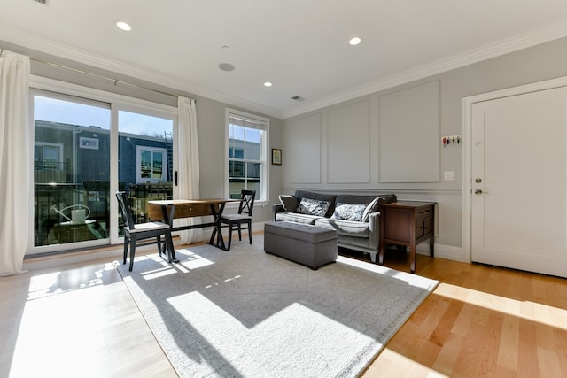 37 P St Unit 5, Boston, MA 02127 - living area with crown molding, light wood finished floors, a decorative wall, and recessed lighting