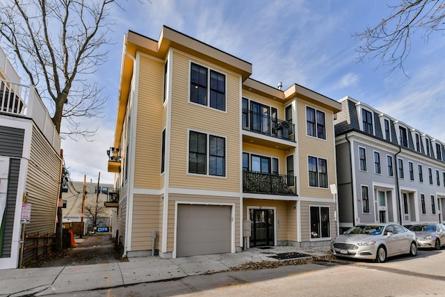 37 P St Unit 5, Boston, MA 02127 - view of building exterior with an attached garage