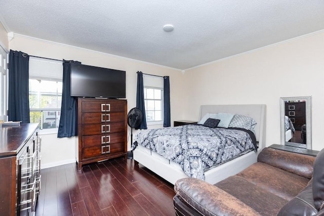 bedroom featuring crown molding, baseboards, dark wood-style floors, and multiple windows