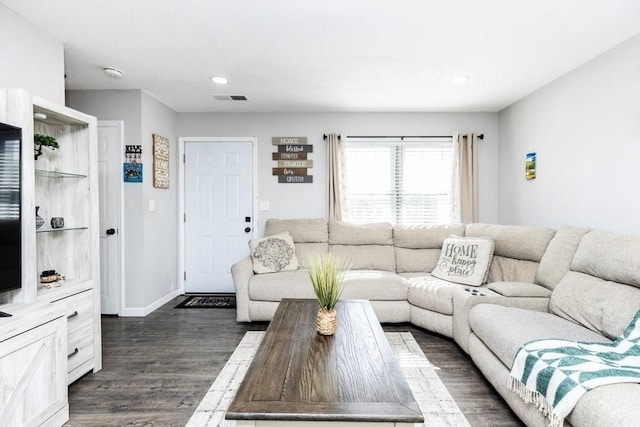 living room featuring recessed lighting, baseboards, dark wood-style floors, and visible vents