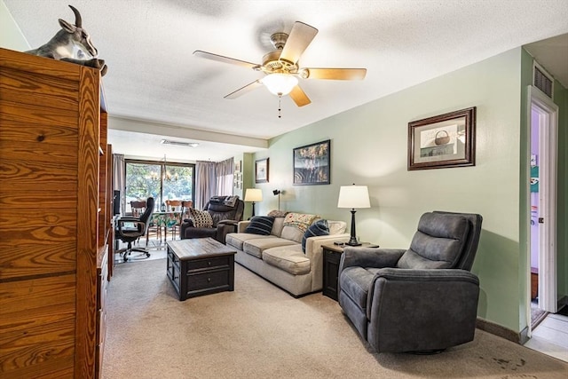 96 Old Colony Ave Unit 153, Taunton, MA 02718 - living room featuring light colored carpet, a ceiling fan, and a textured ceiling