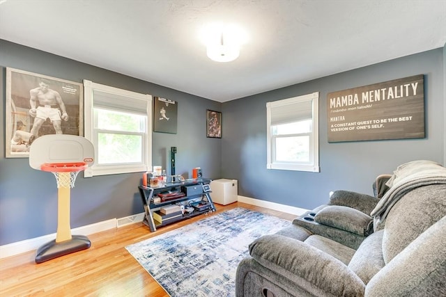 49 Hopkins Dr, Whitman, MA 02382 - sitting room featuring healthy amount of natural light, baseboards, and wood finished floors