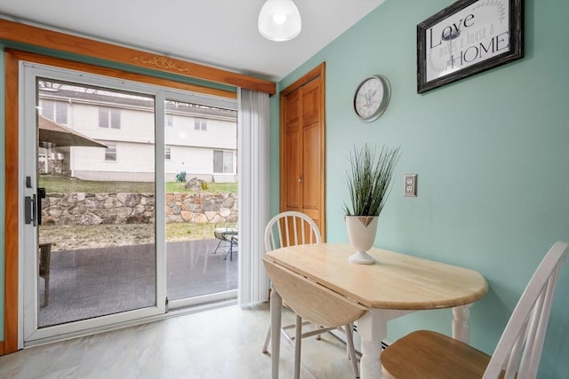 dining room with plenty of natural light