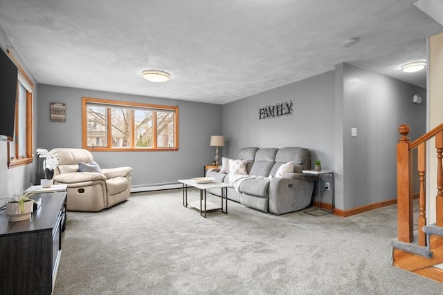 living room featuring baseboards, stairs, carpet flooring, and a baseboard radiator