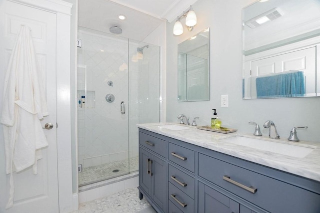 bathroom featuring vanity and walk in shower