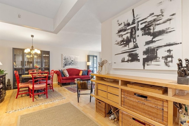 800 Bearses Way Unit 5Ec, Barnstable, MA 02601 - dining space with a chandelier and wood finished floors