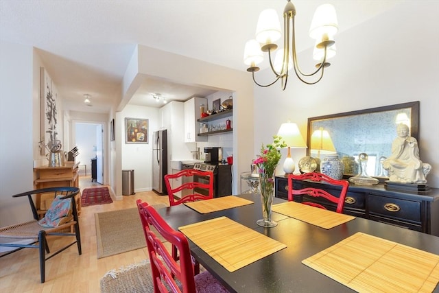 800 Bearses Way Unit 5Ec, Barnstable, MA 02601 - dining room with light wood-style flooring and a chandelier