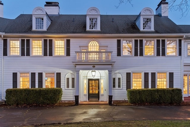 colonial house with a balcony