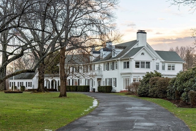 view of front of home with a lawn