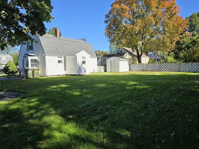 view of yard with a storage unit