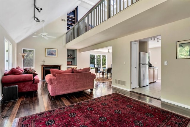 17 Claus, Barnstable, MA 02648 - living room with ceiling fan, hardwood / wood-style floors, baseboards, and high vaulted ceiling