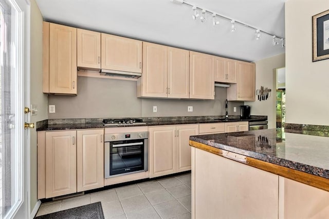 17 Claus, Barnstable, MA 02648 - kitchen featuring stainless steel oven, track lighting, a sink, under cabinet range hood, and gas cooktop