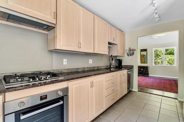 17 Claus, Barnstable, MA 02648 - kitchen featuring appliances with stainless steel finishes, a sink, light brown cabinets, range hood, and light tile patterned floors