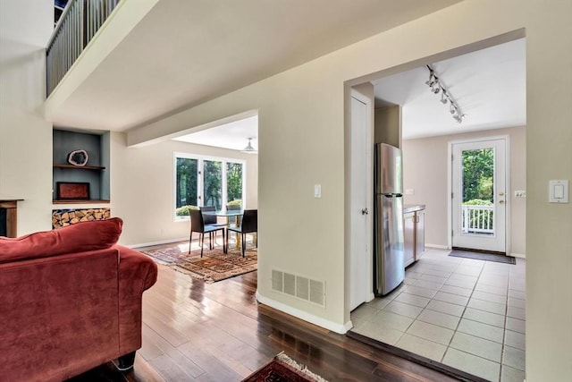 17 Claus, Barnstable, MA 02648 - living area with rail lighting, baseboards, plenty of natural light, and hardwood / wood-style flooring