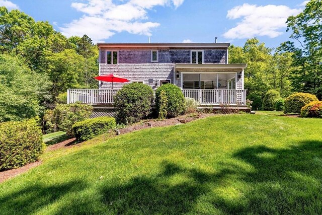 17 Claus, Barnstable, MA 02648 - back of property with a yard and a deck