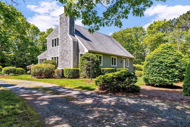 17 Claus, Barnstable, MA 02648 - view of home's exterior featuring a chimney and a shingled roof