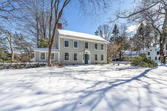 colonial home with a chimney